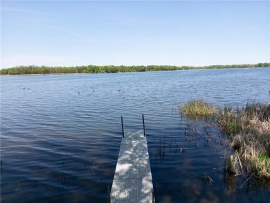 Nature abounds with sightings of great blue herons and bald on Chomonix Golf Course in Minnesota - for sale on GolfHomes.com, golf home, golf lot