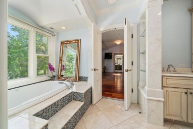 Discover unparalleled luxury in this exquisite 6+1 bedroom, 7 on Hillcrest Country Club in Illinois - for sale on GolfHomes.com, golf home, golf lot