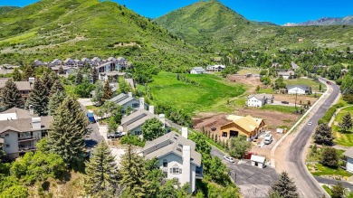 Perched in the heart of Midway's coveted Swiss Oaks community on Homestead Golf Club and Resort in Utah - for sale on GolfHomes.com, golf home, golf lot