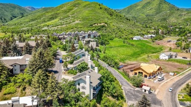 Perched in the heart of Midway's coveted Swiss Oaks community on Homestead Golf Club and Resort in Utah - for sale on GolfHomes.com, golf home, golf lot
