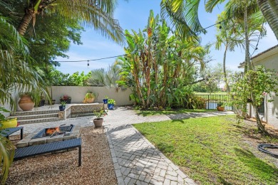 Secluded Waterfront Living in Palm Beach Polo-Tucked away on one on Palm Beach Polo and Country Club in Florida - for sale on GolfHomes.com, golf home, golf lot