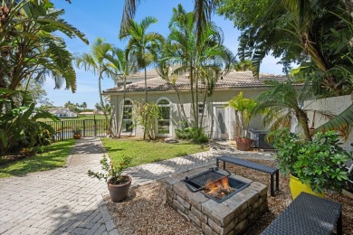 Secluded Waterfront Living in Palm Beach Polo-Tucked away on one on Palm Beach Polo and Country Club in Florida - for sale on GolfHomes.com, golf home, golf lot