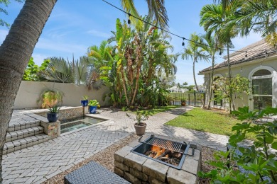 Secluded Waterfront Living in Palm Beach Polo-Tucked away on one on Palm Beach Polo and Country Club in Florida - for sale on GolfHomes.com, golf home, golf lot
