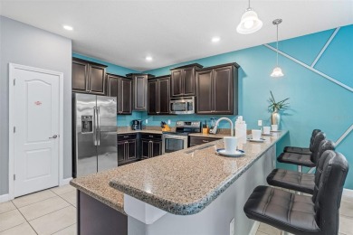 This home is a true turnkey investment opportunity in one of the on The Oasis Club at Champions Gate in Florida - for sale on GolfHomes.com, golf home, golf lot