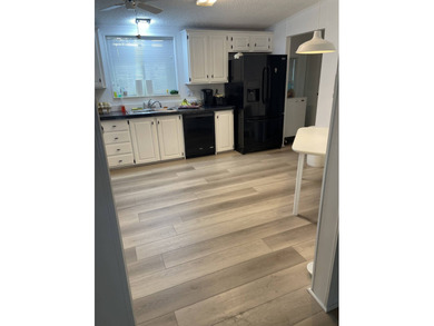 Welcome to this fabulous 3-bedroom 2-bath in sought after on Spanish Lakes Fairways in Florida - for sale on GolfHomes.com, golf home, golf lot