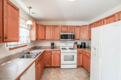 Enjoy beautiful golf course views from this free-standing condo on Mayfair Country Club in Ohio - for sale on GolfHomes.com, golf home, golf lot