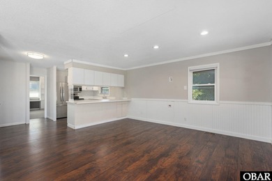 This adorable home sits on Seascape Golf course with great views on Seascape Golf Links in North Carolina - for sale on GolfHomes.com, golf home, golf lot