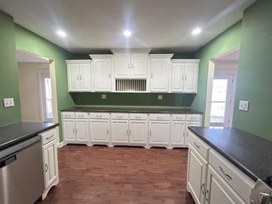 Beautiful setting for this well-maintained 3-bedroom (w/ room in on Cherokee Village North Course in Arkansas - for sale on GolfHomes.com, golf home, golf lot