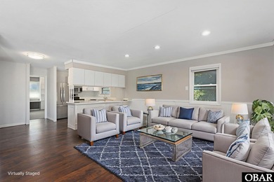 This adorable home sits on Seascape Golf course with great views on Seascape Golf Links in North Carolina - for sale on GolfHomes.com, golf home, golf lot