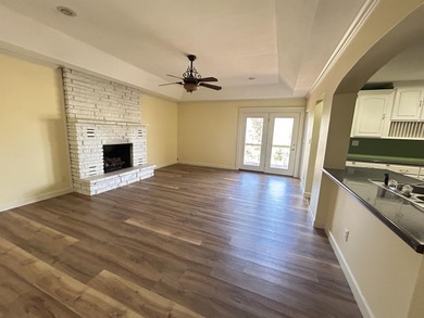 Beautiful setting for this well-maintained 3-bedroom (w/ room in on Cherokee Village North Course in Arkansas - for sale on GolfHomes.com, golf home, golf lot