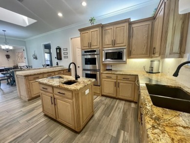 Impeccably updated and meticulously maintained spacious home on Pecan Plantation Country Club in Texas - for sale on GolfHomes.com, golf home, golf lot