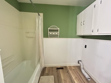 Beautiful setting for this well-maintained 3-bedroom (w/ room in on Cherokee Village North Course in Arkansas - for sale on GolfHomes.com, golf home, golf lot