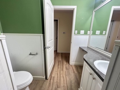 Beautiful setting for this well-maintained 3-bedroom (w/ room in on Cherokee Village North Course in Arkansas - for sale on GolfHomes.com, golf home, golf lot