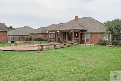 This captivating 4-bed, 3.5-bath home in sought-after Bringle on Texarkana Golf Ranch in Texas - for sale on GolfHomes.com, golf home, golf lot