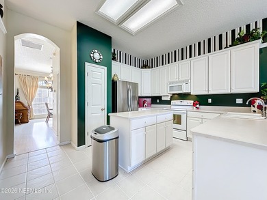 Enjoy your private slice of paradise in the sought-after Eagle on Eagle Harbor Golf Club in Florida - for sale on GolfHomes.com, golf home, golf lot