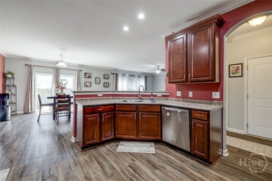 Welcome to your dream home in the highly sought-after Lost on Lost Plantation Golf Club in Georgia - for sale on GolfHomes.com, golf home, golf lot