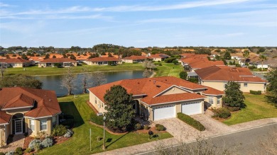 STUNNING WATER VIEWS and UPGRADES in abundance await you in this on Miona Lake Golf Club in Florida - for sale on GolfHomes.com, golf home, golf lot