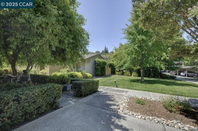 Lovely light filled Sonoma model with scenic outlook from your on Rossmoor Golf Course in California - for sale on GolfHomes.com, golf home, golf lot