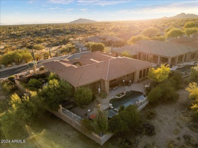 Located on the Legend Trail Golf Course, this exceptional home on Legend Trail Golf Club in Arizona - for sale on GolfHomes.com, golf home, golf lot