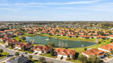 STUNNING WATER VIEWS and UPGRADES in abundance await you in this on Miona Lake Golf Club in Florida - for sale on GolfHomes.com, golf home, golf lot