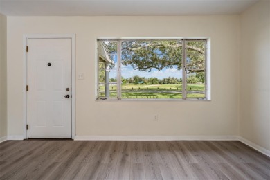Charming Mid-Century Home with Golf Course Views! Nestled among on Babe Zaharias Golf Course in Florida - for sale on GolfHomes.com, golf home, golf lot