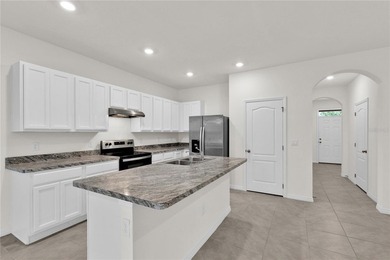 Some homes simply feel right the moment you arrive. That is on Ridgewood Lakes Golf and Country Club in Florida - for sale on GolfHomes.com, golf home, golf lot