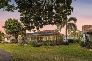 This gorgeous meticulously maintained split-bedroom home is on Woodmont Country Club in Florida - for sale on GolfHomes.com, golf home, golf lot