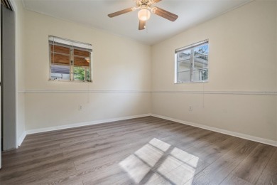 Charming Mid-Century Home with Golf Course Views! Nestled among on Babe Zaharias Golf Course in Florida - for sale on GolfHomes.com, golf home, golf lot
