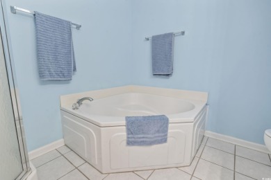 Immaculately kept 3BR/2.5BA end-unit townhouse-style condo in on Glen Dornoch Waterway Golf Links in South Carolina - for sale on GolfHomes.com, golf home, golf lot