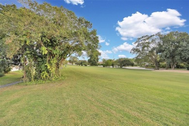 This gorgeous meticulously maintained split-bedroom home is on Woodmont Country Club in Florida - for sale on GolfHomes.com, golf home, golf lot