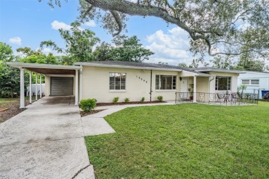 Charming Mid-Century Home with Golf Course Views! Nestled among on Babe Zaharias Golf Course in Florida - for sale on GolfHomes.com, golf home, golf lot