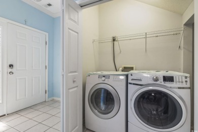 Immaculately kept 3BR/2.5BA end-unit townhouse-style condo in on Glen Dornoch Waterway Golf Links in South Carolina - for sale on GolfHomes.com, golf home, golf lot