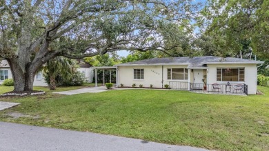 Charming Mid-Century Home with Golf Course Views! Nestled among on Babe Zaharias Golf Course in Florida - for sale on GolfHomes.com, golf home, golf lot