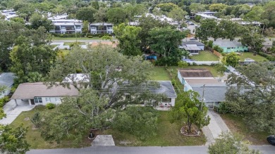 Charming Mid-Century Home with Golf Course Views! Nestled among on Babe Zaharias Golf Course in Florida - for sale on GolfHomes.com, golf home, golf lot