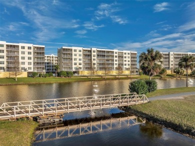 2 BEDROOM / 2 BATH LAKEFRONT CONDO WITH SPECTACULAR WEST FACING on East Bay Golf Club in Florida - for sale on GolfHomes.com, golf home, golf lot