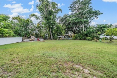 Charming Mid-Century Home with Golf Course Views! Nestled among on Babe Zaharias Golf Course in Florida - for sale on GolfHomes.com, golf home, golf lot
