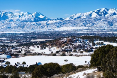 This exceptional lot sits on one of the premier streets in Red on Red Ledges Golf Club in Utah - for sale on GolfHomes.com, golf home, golf lot