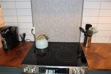 FURNISHED TOTALLY UPDATED THIRD FLOOR CONDO****Reside in the on On Top Of The World Golf Course in Florida - for sale on GolfHomes.com, golf home, golf lot