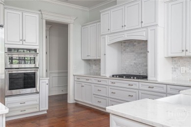Elegant and expansive, this 3-bedroom, 4.5-bath home offers over on The Landings Club - Marshwood in Georgia - for sale on GolfHomes.com, golf home, golf lot