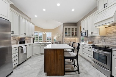 Set on a beautifully manicured homesite in The Reserve on Plantation Golf and Country Club in Florida - for sale on GolfHomes.com, golf home, golf lot