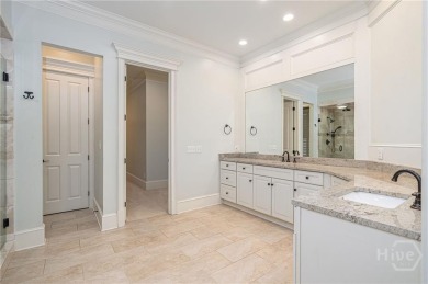 Elegant and expansive, this 3-bedroom, 4.5-bath home offers over on The Landings Club - Marshwood in Georgia - for sale on GolfHomes.com, golf home, golf lot