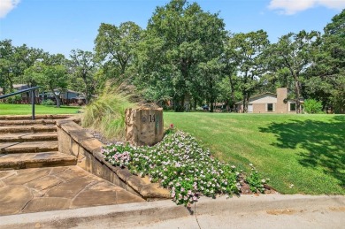 Perched on the tee box of the 14th hole of the beautiful Lake on Lake Kiowa Golf Course in Texas - for sale on GolfHomes.com, golf home, golf lot
