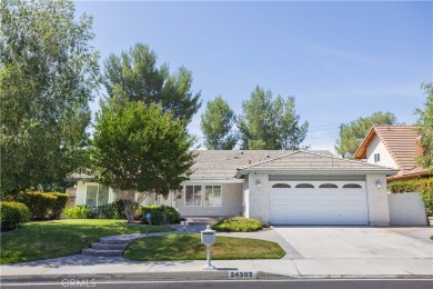 This beautiful home is nestled amidst gently rolling hills in on Vista Valencia Golf Course in California - for sale on GolfHomes.com, golf home, golf lot