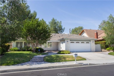 This beautiful home is nestled amidst gently rolling hills in on Vista Valencia Golf Course in California - for sale on GolfHomes.com, golf home, golf lot