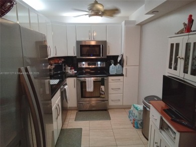 Come turn this 1,275 sf 2 Bdrm 2 Ba Convertible with the wall up on Pembroke Lakes Golf Club in Florida - for sale on GolfHomes.com, golf home, golf lot