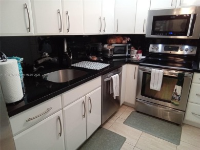 Come turn this 1,275 sf 2 Bdrm 2 Ba Convertible with the wall up on Pembroke Lakes Golf Club in Florida - for sale on GolfHomes.com, golf home, golf lot