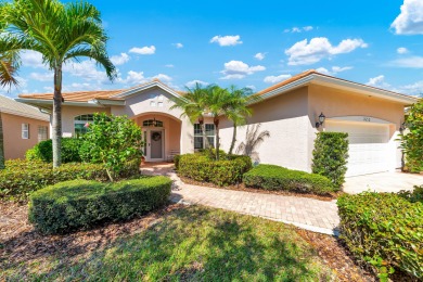Enjoy breathtaking lake and golf course views from this on Monarch Country Club in Florida - for sale on GolfHomes.com, golf home, golf lot