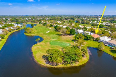 Enjoy breathtaking lake and golf course views from this on Monarch Country Club in Florida - for sale on GolfHomes.com, golf home, golf lot