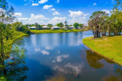 Enjoy breathtaking lake and golf course views from this on Monarch Country Club in Florida - for sale on GolfHomes.com, golf home, golf lot