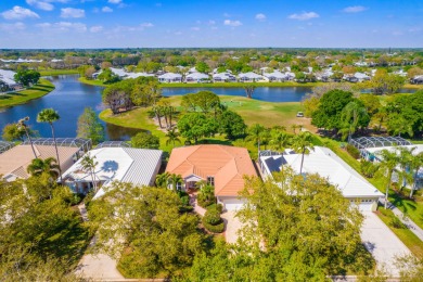 Enjoy breathtaking lake and golf course views from this on Monarch Country Club in Florida - for sale on GolfHomes.com, golf home, golf lot